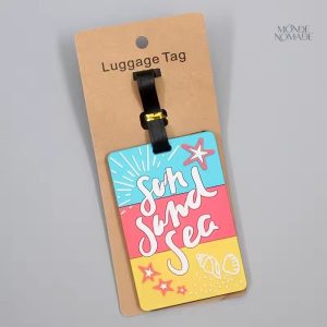 Étiquette de bagage avec motif soleil et plage