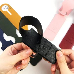 Système de sécurité pour étiquettes de valise