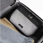 Essentielle trousse de voyage pour homme, design sobre