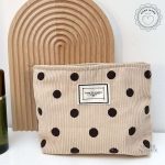 Trousse de toilette colorée à motifs pois stylés