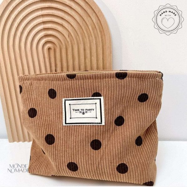 Trousse de toilette compacte à pois pour voyages