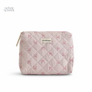 Trousse de toilette rose pâle avec motifs nœuds