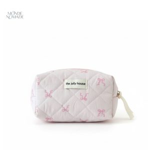 Accessoire de voyage rose pâle pour soins