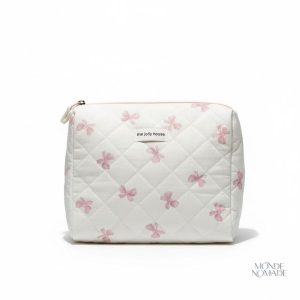 Trousse de toilette en tissu matelassé motifs nœuds papillon