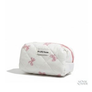 Trousse de toilette motifs nœuds papillon en tissu matelassé