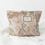 Trousse de toilette à motif floral élégant