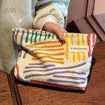 Trousse de maquillage tendance en velours à rayures
