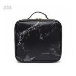 Trousse de maquillage chic avec motif marbré
