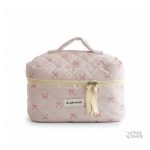 Vanity case rose pâle avec motifs de nœuds élégants