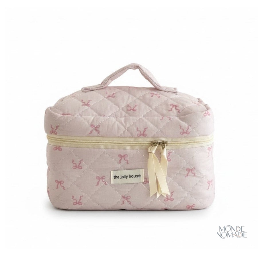 Vanity case rose pâle avec motifs de nœuds élégants