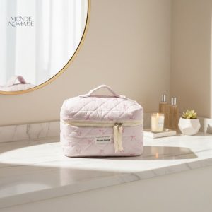 Vanity rose avec motifs nœuds, idéal pour le rangement