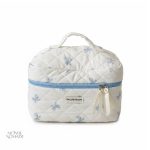 Mallette de maquillage en tissu matelassé avec style