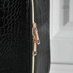 Trousse à maquillage au design crocodile pratique