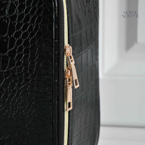 Trousse à maquillage au design crocodile pratique